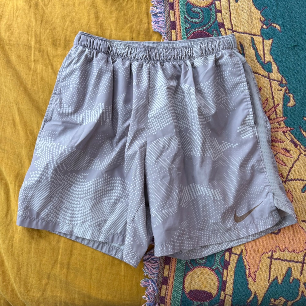 Nike Men's Light Gray Athletic Shorts with Subtle Dot Pattern